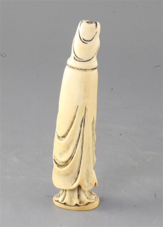 A Chinese walrus ivory figure of a Guanyin, 18th/19th century, height 17cm